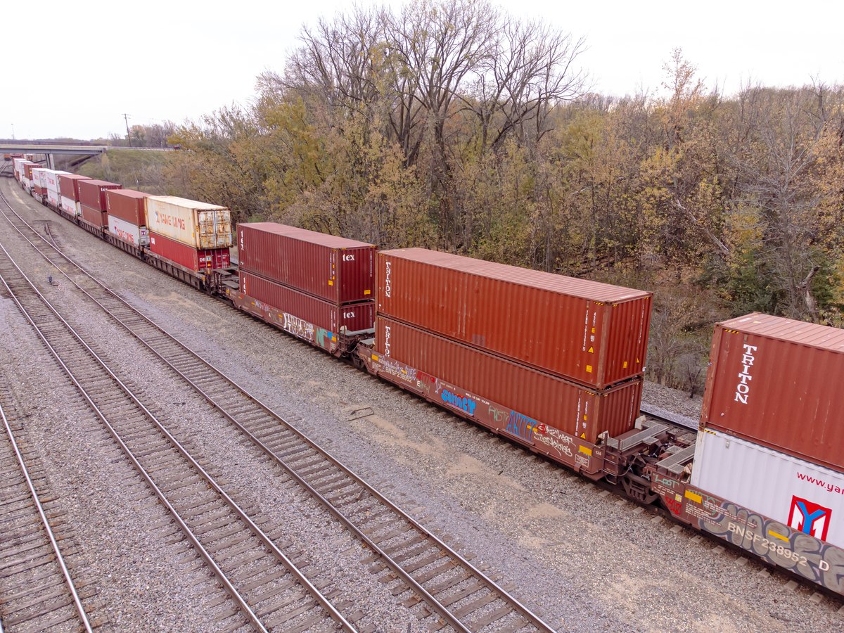 Modern intermodal freight train carrying double-stacked containers
