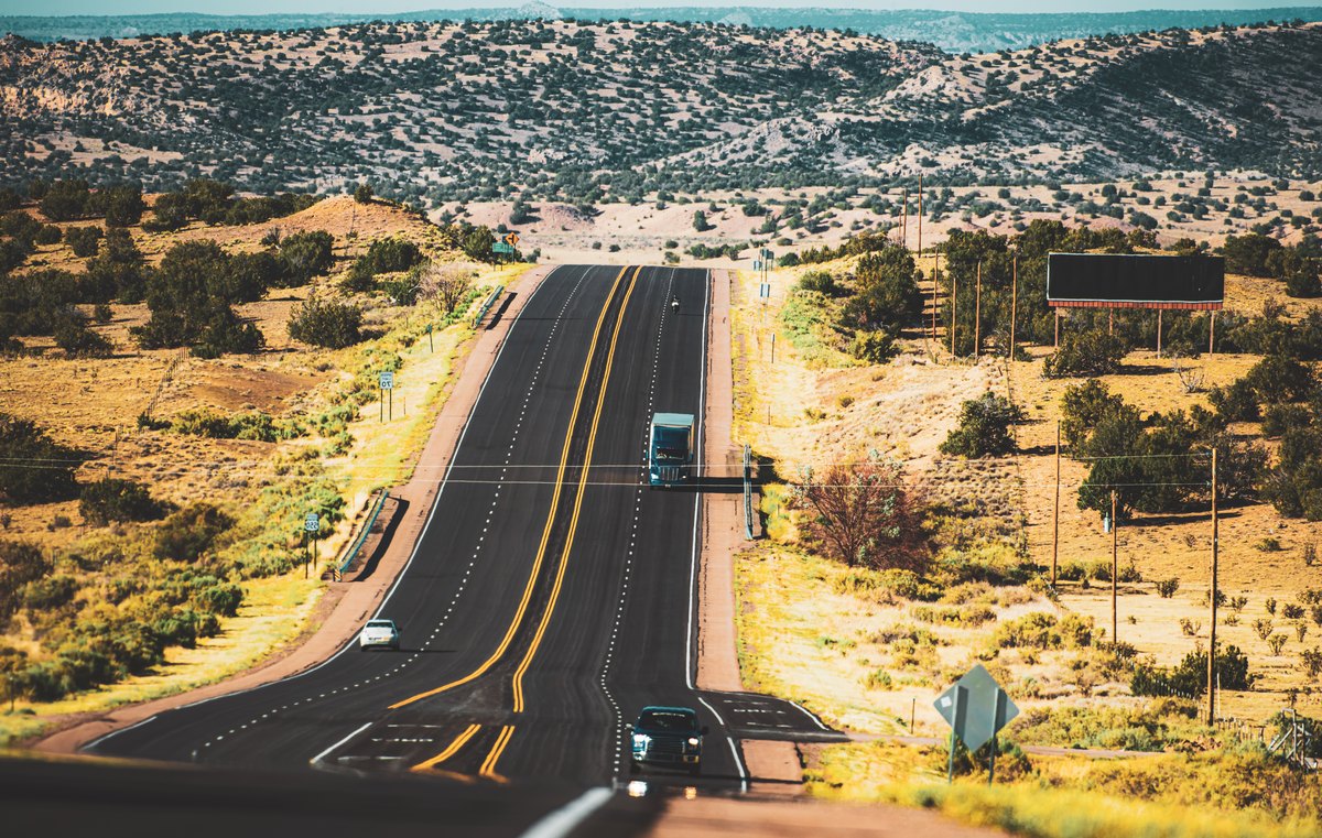 Open highway through California desert terrain