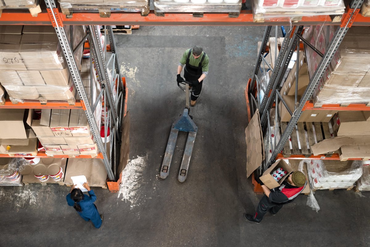 People taking care of warehouse logistics together