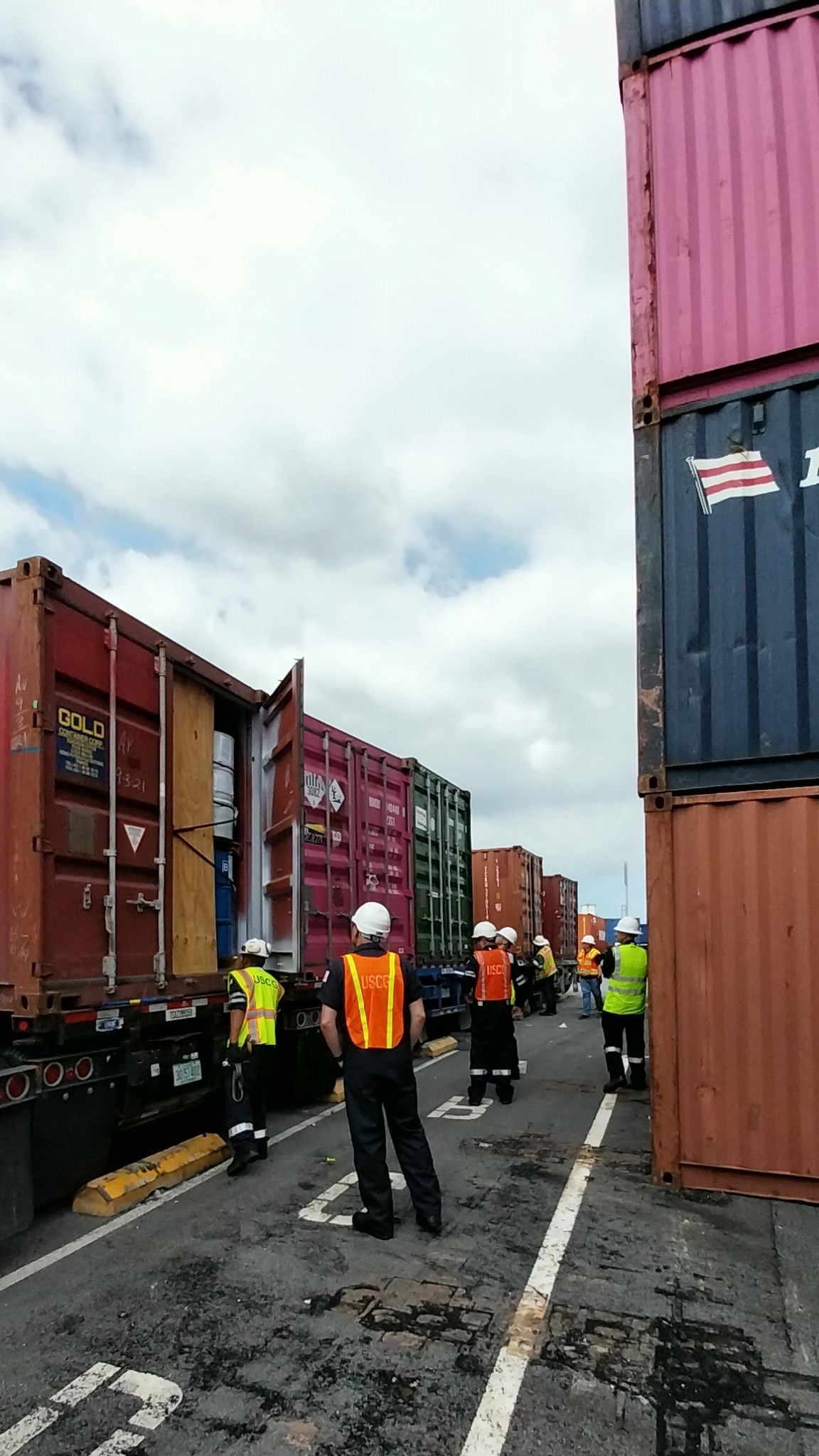 Cargo inspection between containers at the Los Angeles-Long Beach port complex